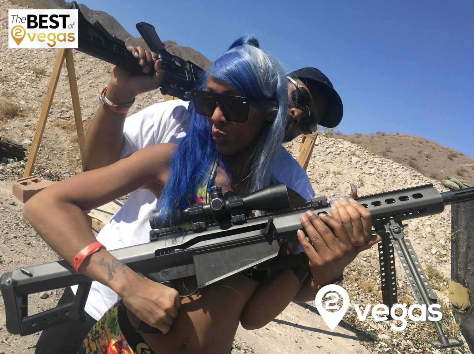 Couple shooting the 50 Cal together with 2Vegas.com
