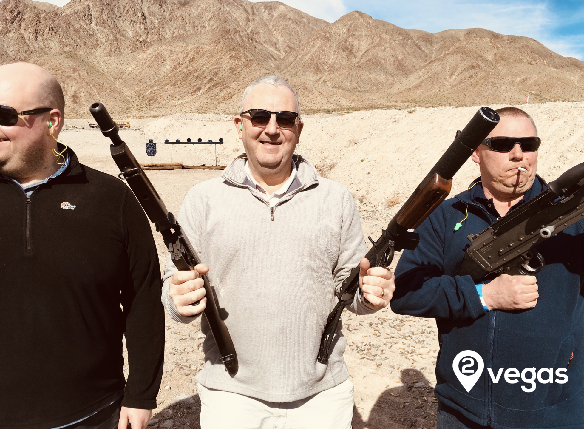 Certified 2Vegas range safety officer beside a guest in the desert